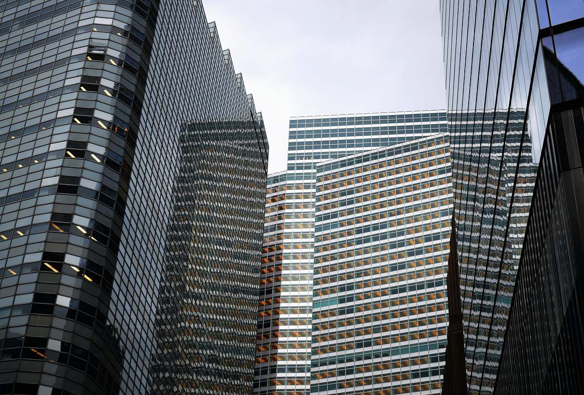 high rise low angle photo of high raise buildings architecture